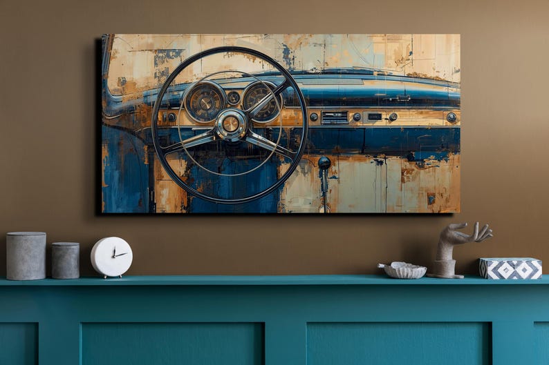 May include: A rectangular wall art print depicting the interior dashboard and steering wheel of a vintage car. The artwork features a distressed, weathered aesthetic with a colour palette of deep blue, muted gold, and brown tones.