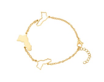 May include: A gold-colored bracelet featuring three map-shaped charms connected by a delicate chain. The bracelet has a lobster clasp closure and an adjustable chain for a comfortable fit. The charms appear to be outlines of different states.