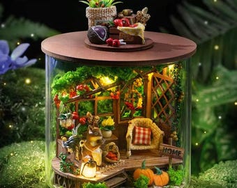 DIY-boekenhoekset – gezellige miniatuurscène met warm interieur, led-verlichting, boekenplankdecor