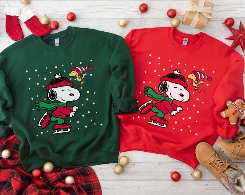 Discover Christmas Snoopy Ice Skating Sweatshirt