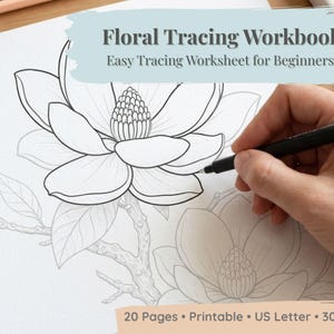 May include: A black pen tracing a large floral design on a white page. The page is part of a "Floral Tracing Workbook" with the text "Easy Tracing Worksheet for Beginners". The workbook includes 20 pages and is US Letter size.