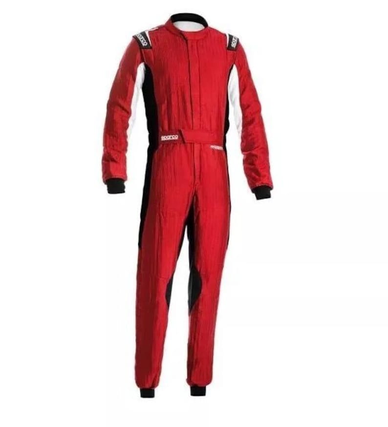 May include: A red racing suit with black and white accents. The suit features a high collar, long sleeves, and a fitted waist. The shoulders have white panels, and the suit has black panels on the sides and legs. The suit is designed for motorsports.
