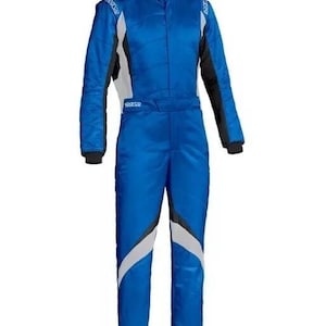 May include: A blue racing suit with white and black accents. The suit has a high collar, long sleeves, and a full-length zipper. The suit has the word "Sparco" printed on the chest and shoulders. The suit is designed for motorsports.