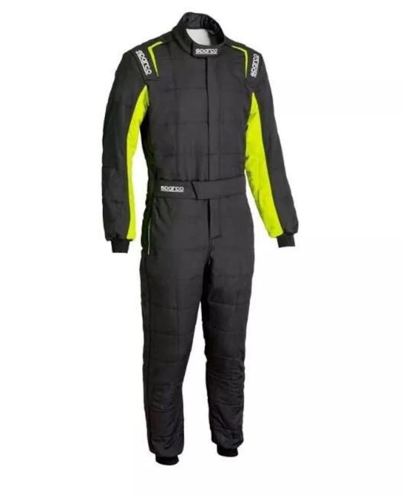 May include: Black racing suit with neon yellow accents on the sleeves and shoulders. The suit has a high collar and a belt at the waist. The Sparco logo is visible on the shoulders and chest.