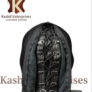 May include: Black leather hood with a zippered opening and a laced interior. The hood features metal hardware and a strap closure. The product is from Kashif Enterprises Leather Goods.