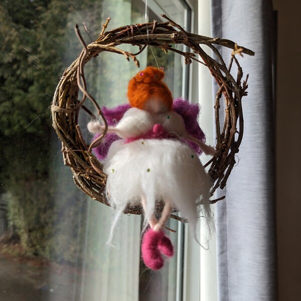 Nursery mobile felted wool fairy on a twig swing