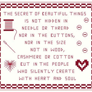 May include: Cross-stitch design with a white background and a burgundy border. The text reads "THE SECRET OF BEAUTIFUL THINGS" and continues with a message about creativity. Illustrations of a spool of thread, needle, buttons, and a heart are included.