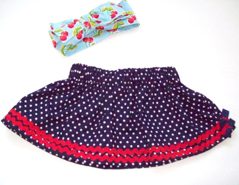 Ahoy Vintage Inspired Pin up Baby Sailor Baby Navy Polka Dot Skirt with Red Trim and Bows