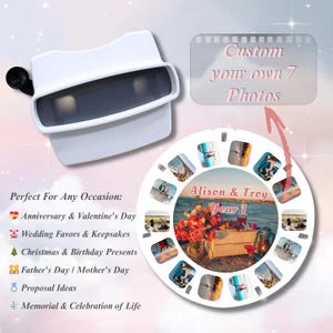 Könnte beinhalten: Ein weißer View-Master-Betrachter mit einem schwarzen Fokusknopf. Das Bild zeigt eine benutzerdefinierte Foto-Rolle mit dem Text "Alison & Troy Year 1" und den Worten "Custom your own 7 Photos". Die Rolle enthält 7 Fotos.