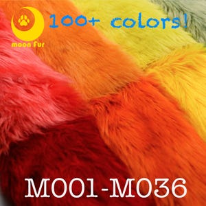May include: Close-up of colorful faux fur fabric in shades of red, orange, yellow, and green. The image includes the text "100+ colors!" and "MO01-M036". The Moon Fur logo is in the upper left corner.