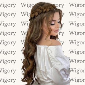 May include: A woman with long, wavy brown hair styled with a braided crown. She wears a white off-the-shoulder top. The background features the word "Wigory" repeated in a pattern.