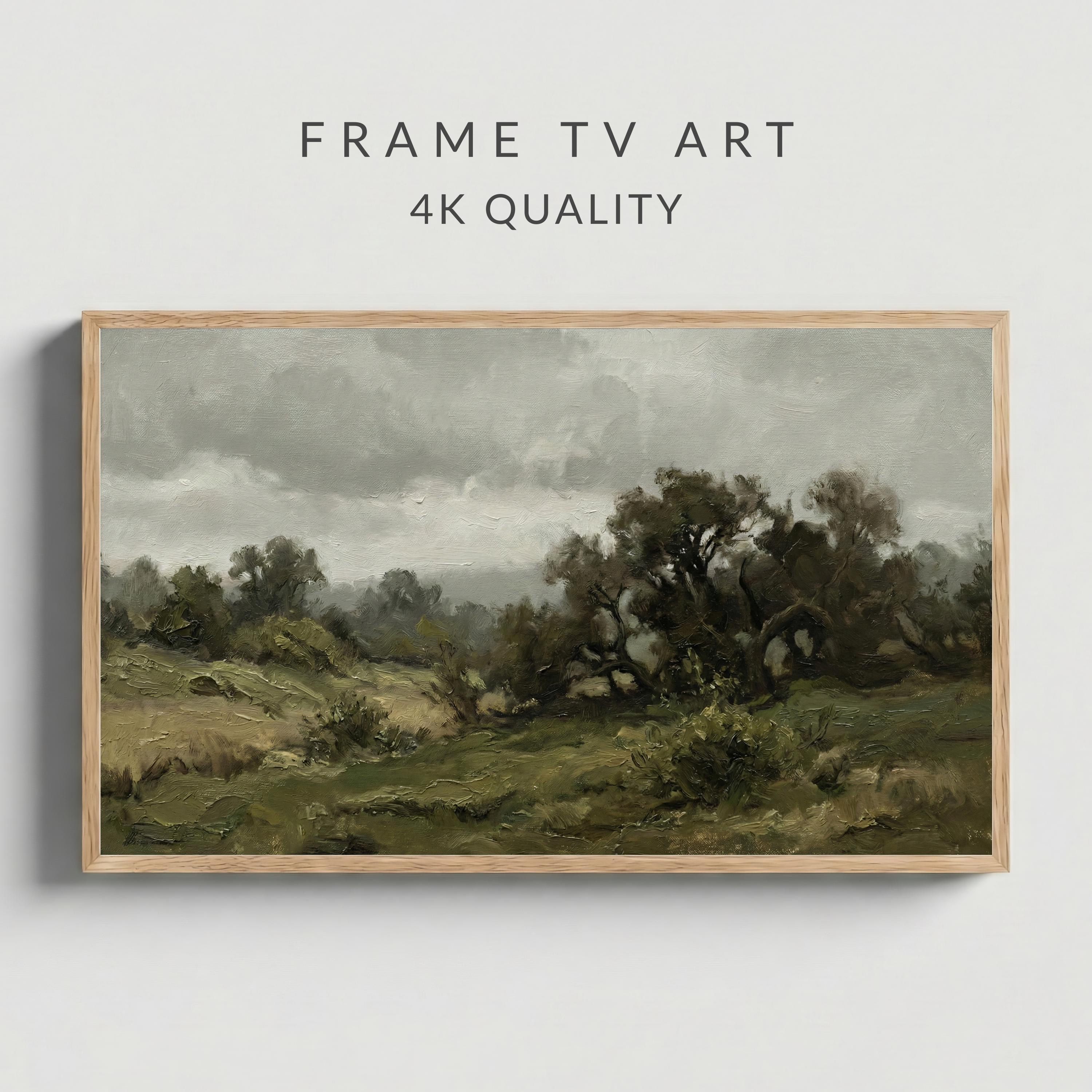 Könnte beinhalten: Gerahmtes Landschaftsgemälde mit einem natürlichen Holzrahmen. Das Kunstwerk zeigt eine ländliche Szene mit grünen Feldern, Bäumen und einem bewölkten Himmel. Der Text "FRAME TV ART" und "4K QUALITY" ist oben zu sehen.
