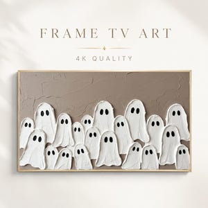 Pode incluir: Uma obra de arte digital retangular para Frame TV com um fundo taupe texturizado e uma coleção de fantasmas brancos em estilo empasto com olhos ovais pretos. A imagem inclui o texto FRAME TV ART e 4K QUALITY no topo.