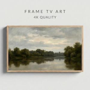 May include: A framed landscape painting featuring a river scene with trees and a cloudy sky. The artwork is in a wooden frame and has the text "FRAME TV ART" and "4K QUALITY" at the top.
