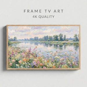May include: A framed landscape painting depicting a tranquil river scene. The artwork showcases a colourful array of wildflowers in the foreground, with trees and a reflective body of water in the background. The text "FRAME TV ART 4K QUALITY" is displayed at the top.