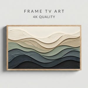 May include: A framed artwork with a layered, abstract design. The piece features undulating waves in shades of cream, beige, green, and blue, creating a textured appearance. The text "FRAME TV ART" and "4K QUALITY" are displayed at the top.