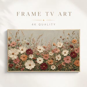May include: Digital artwork for a Frame TV featuring a textured oil painting of a wildflower meadow. The scene displays white, pink, orange, and deep red cosmos flowers against a light grey background. Text reads FRAME TV ART 4K QUALITY.