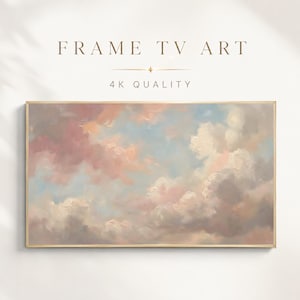 May include: A rectangular digital artwork titled FRAME TV ART 4K QUALITY featuring an oil painting style sky with soft, blended clouds in shades of dusty pink, cream, and pale blue, enclosed within a thin, light-toned wooden frame border.