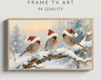 May include: A framed digital art print depicting three birds on a snowy branch, each adorned with a red Santa hat. The winter scene is set in a snowy forest, with the text "FRAME TV ART 4K QUALITY".