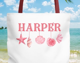 Bolso de mano personalizado con nombre, temática playera y oceánica, con conchas marinas personalizadas.