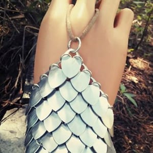 Scalemaile Hand Armor with leather ties .