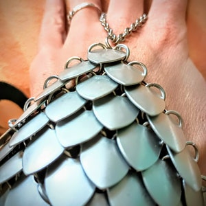Scale Hand Armor with chains .