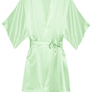 May include: A light green satin robe with a self-tie sash. The robe has a V-neck and short sleeves.