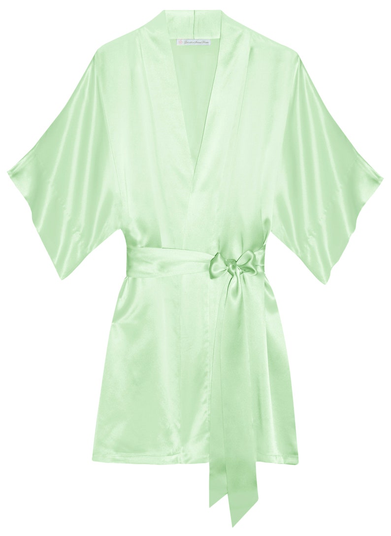 May include: A light green satin robe with a self-tie sash. The robe has a V-neck and short sleeves.