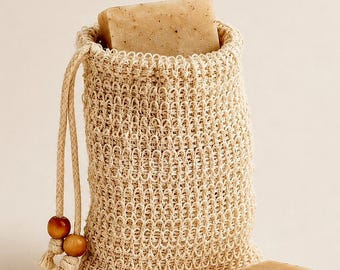 Jabón artesanal sorpresa en bolsa de malla exfoliante para conservar el jabón, con muestra gratuita.