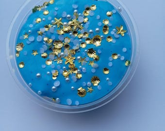 ocean/sea Themed slime with assortment of charms.