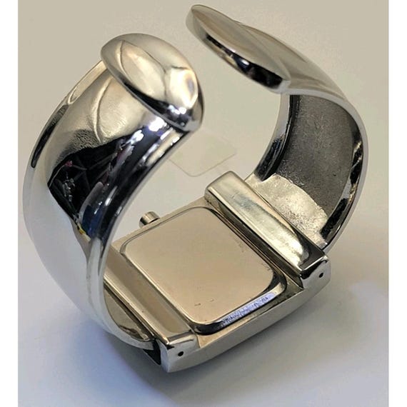 silver-tone rectangular cuff watch with a black d… - image 3