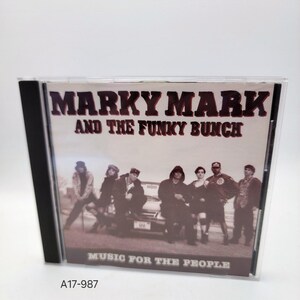 May include: A CD case featuring the album "Music for the People" by Marky Mark and the Funky Bunch. The album cover displays a group of people in front of a car, with the band's name in large, bold letters. The case is in a clear plastic sleeve.