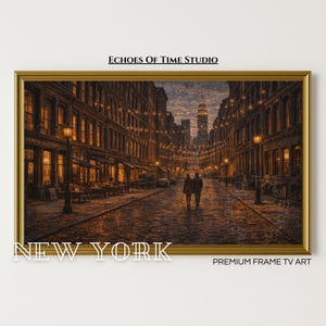 May include: A framed print of a New York City street scene at dusk. The artwork features a cobblestone street, streetlights, and buildings with string lights. The text "NEW YORK" and "PREMIUM FRAME TV ART" are visible.