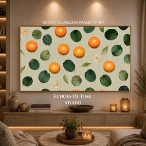 May include: A digital wall art print for a television screen featuring a repeating pattern of bright orange citrus fruits, dark green leaves, and small white blossoms set against a light beige, textured background with the text INSTANT DOWNLOAD FRAME TV ART.