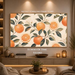 May include: A digital artwork for a television screen featuring a repeating pattern of bright orange citrus fruits, green leaves, and small white blossoms on a cream-colored background. The text INSTANT DOWNLOAD FRAME TV ART is visible.