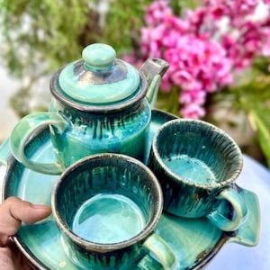 Complete teal ceramic tea set in hand Khurja India artisan pottery housewarming gift