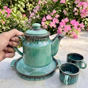 Handmade teal ceramic tea set with tray close up Khurja India artisan pottery gift