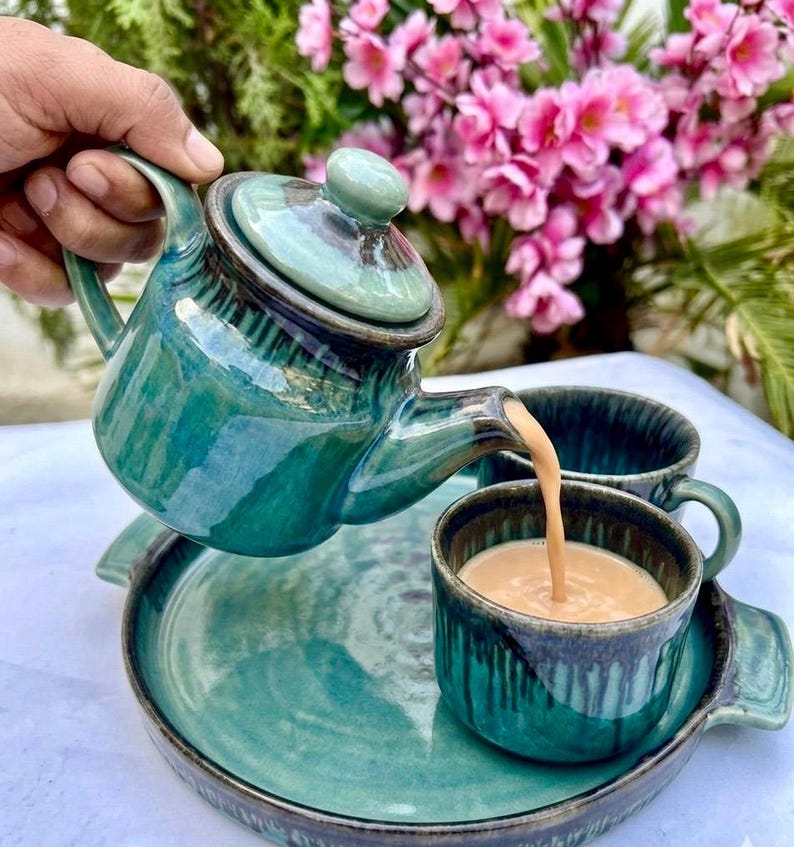 Teal ceramic teapot pouring tea handmade Khurja pottery ocean glaze tea lover gift