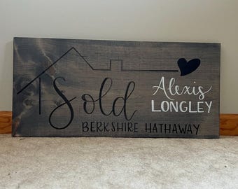 realtor “sold” sign (wooden)
