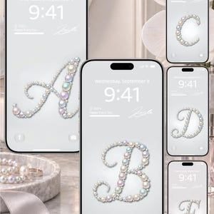 May include: Multiple smartphones displaying digital wallpapers featuring elegant cursive letters formed by iridescent pearls. Each screen shows the time 9:41, the date Wednesday, September 9, and a signature. The letters A, B, C, D, and E are visible.