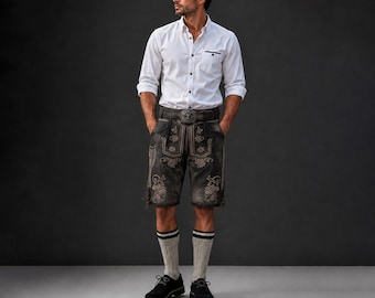 May include: A man wearing a white button-down shirt, traditional leather shorts with ornate embroidery, gray socks with black stripes, and black shoes. The shorts have a decorative belt buckle. The background is a dark gray.
