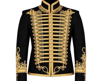 May include: Black military-style jacket with gold embroidery and trim. The jacket features a high collar and ornate gold detailing across the chest and sleeves. The gold embroidery includes intricate patterns and small, pearl-like embellishments, creating a formal and elegant appearance.