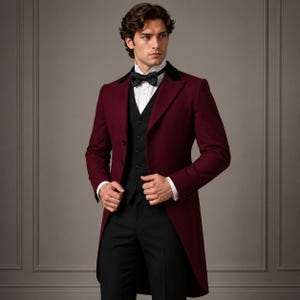 May include: A burgundy tailcoat jacket with black lapels, worn over a black waistcoat and black trousers. The ensemble includes a crisp white collared shirt and a black bow tie. The jacket features two front buttons and long, structured tails.