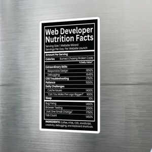 May include: A rectangular black and white magnet featuring a Web Developer Nutrition Facts label. The text lists humorous categories like Responsive Design, Debugging, and CSS Troubleshooting with high percentages, plus ingredients like Coffee and HTML.