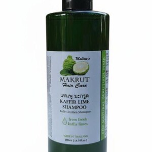 May include: A green bottle of Makrut Kaffir Lime Shampoo. The label features the brand name, product name, and an illustration of a kaffir lime. The bottle contains 500ml (16.9 fl oz) of shampoo and is made in Thailand.