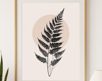Könnte beinhalten: Gerahmter Kunstdruck mit einer schwarzen Farn-Illustration vor einem pfirsichfarbenen Kreis. Das Kunstwerk ist in einem goldfarbenen Rahmen gehalten und schafft eine minimalistische und moderne Ästhetik. Ideal für die Inneneinrichtung.