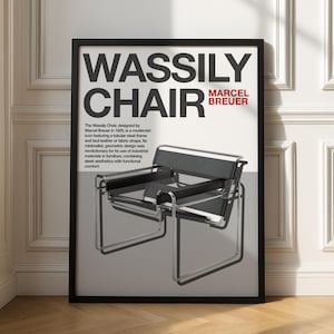 May include: A framed poster of the Wassily Chair, designed by Marcel Breuer. The poster shows the chair's design, with a tubular steel frame and black leather or fabric straps. Text on the poster describes the chair's modernist design and use of industrial materials.