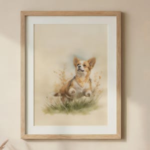 May include: A framed watercolour painting of a Corgi dog. The dog is brown and white, set in a grassy scene. The artwork is displayed above a wooden table with vases, picture frames, and a potted fern.