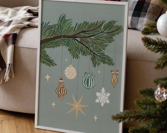 Puede incluir: Una lámina artística vertical enmarcada con fondo verde salvia y una rama de pino verde oscuro en la parte superior. De la rama cuelgan varios adornos navideños dorados, blancos y verdes, incluyendo bolas, un copo de nieve y estrellas.