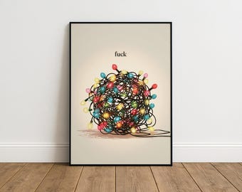 May include: A framed print featuring a tangled ball of colorful Christmas lights. The lights are in various colors, including red, yellow, blue, and green. The word "fuck" is printed above the lights.